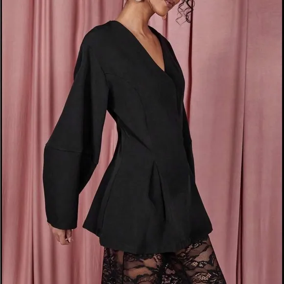 Black puff sleeve v neck flare cinched waist hourglass shaped blazer